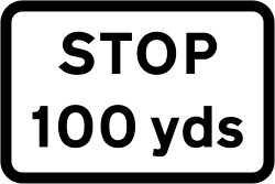 UK warning sign showing a STOP junction ahead, with a distance of 100 yards