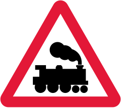 UK level crossing without barrier or gate ahead warning sign: a red-bordered triangle with a black steam locomotive
