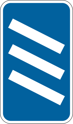 UK countdown marker with three diagonal bars, placed 300 yards before an exit