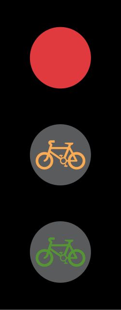 UK traffic signal for pedal cycles, with red, amber and green lights showing a bicycle symbol